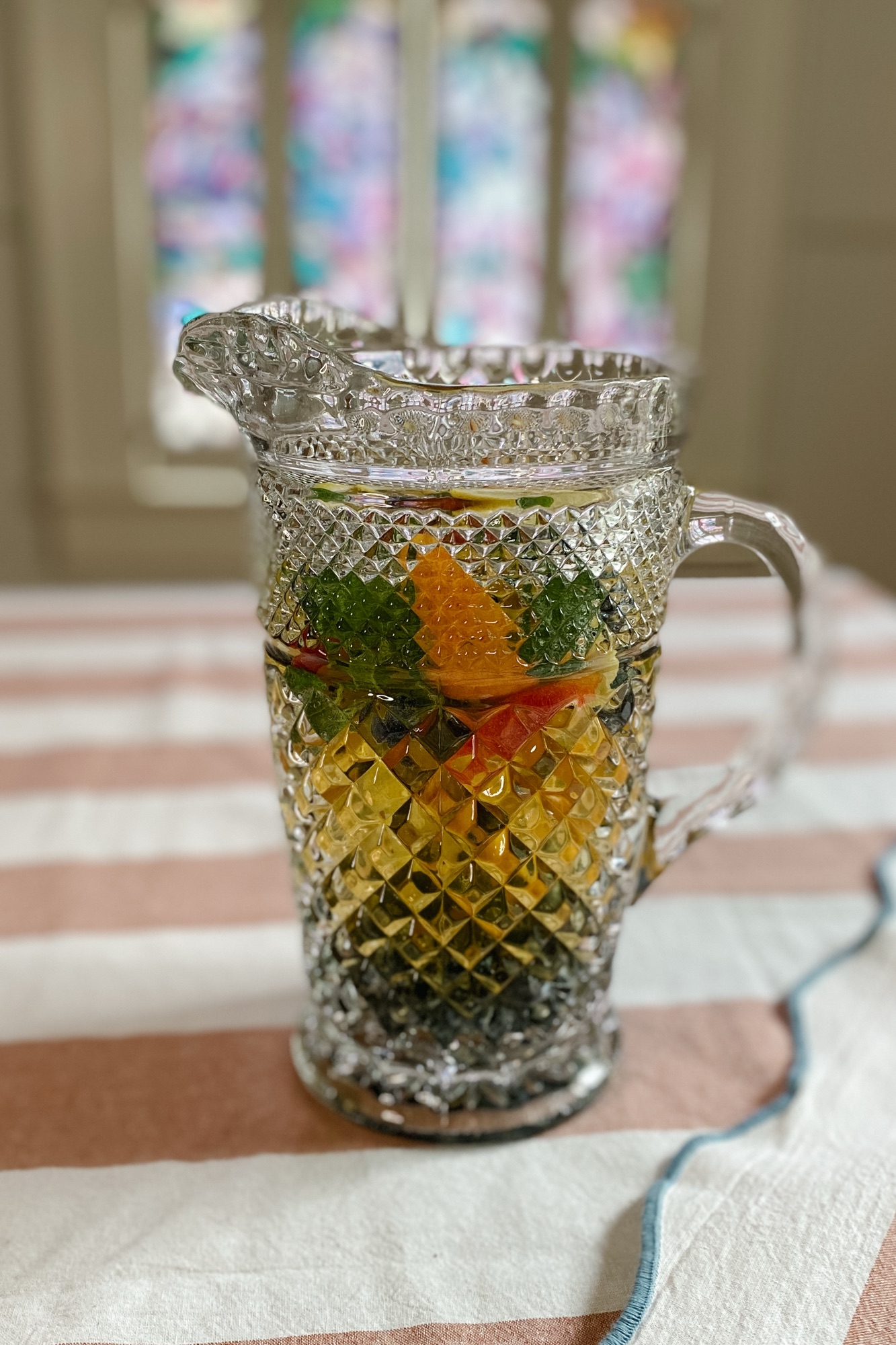vintage glass pitcher with a beautiful southern sangria